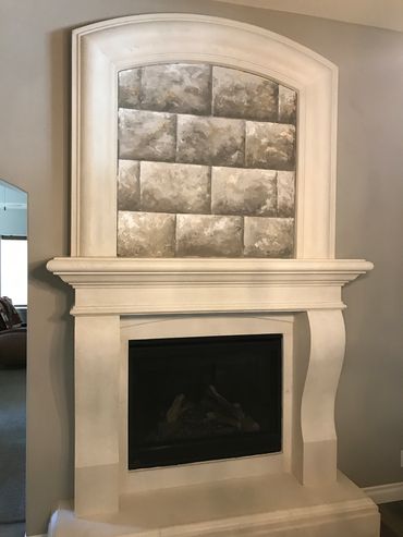 Painted "faux cut stones" on wall above fireplace mantle by Jill Roberts. Temecula, CA.