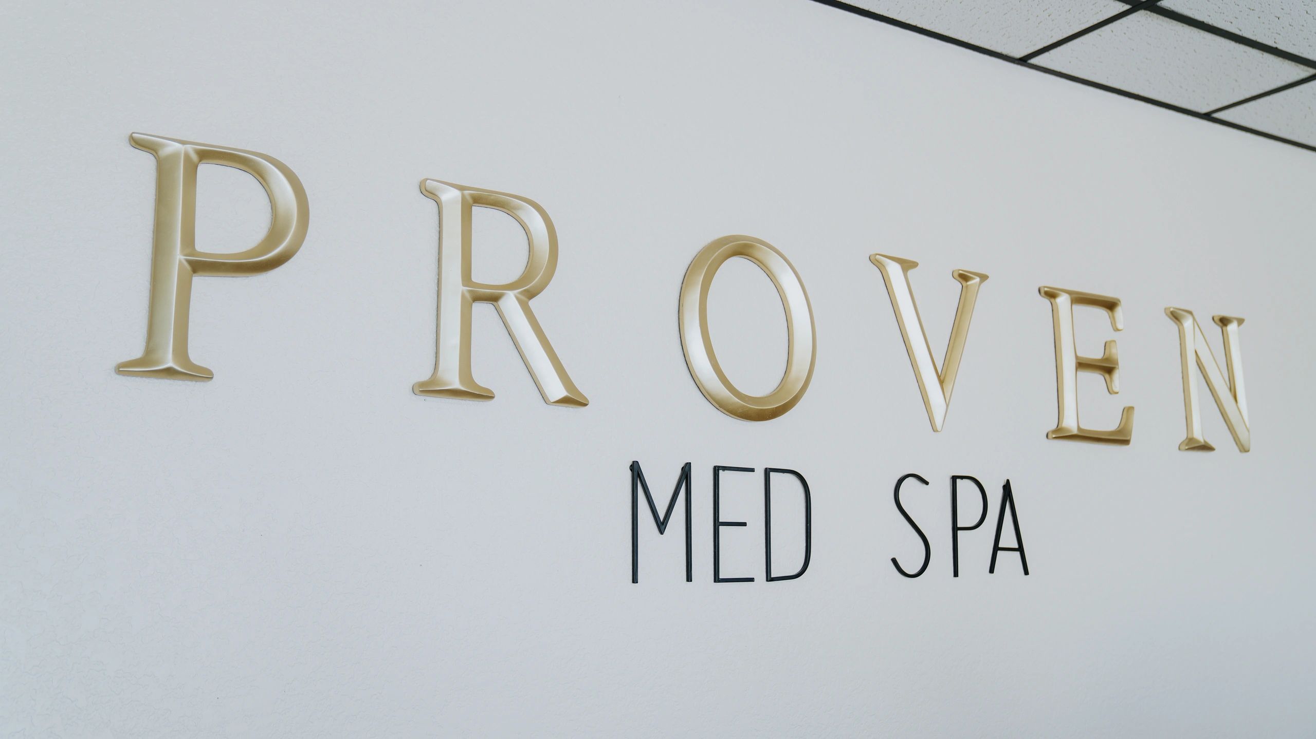 Clean, professional medical spa treatment room with neutral tones at Proven Aesthetics Llc in Cleburne