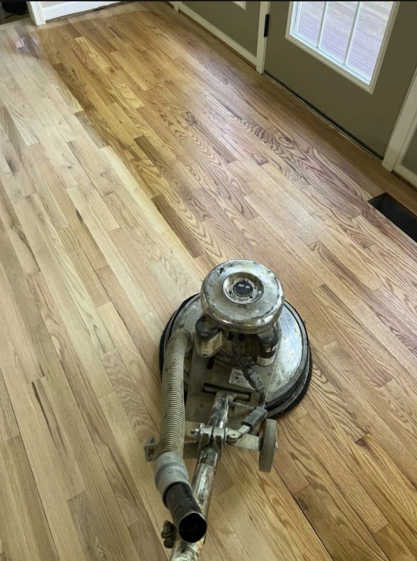 Original hardwood floor being sanded in a Shaker Heights home