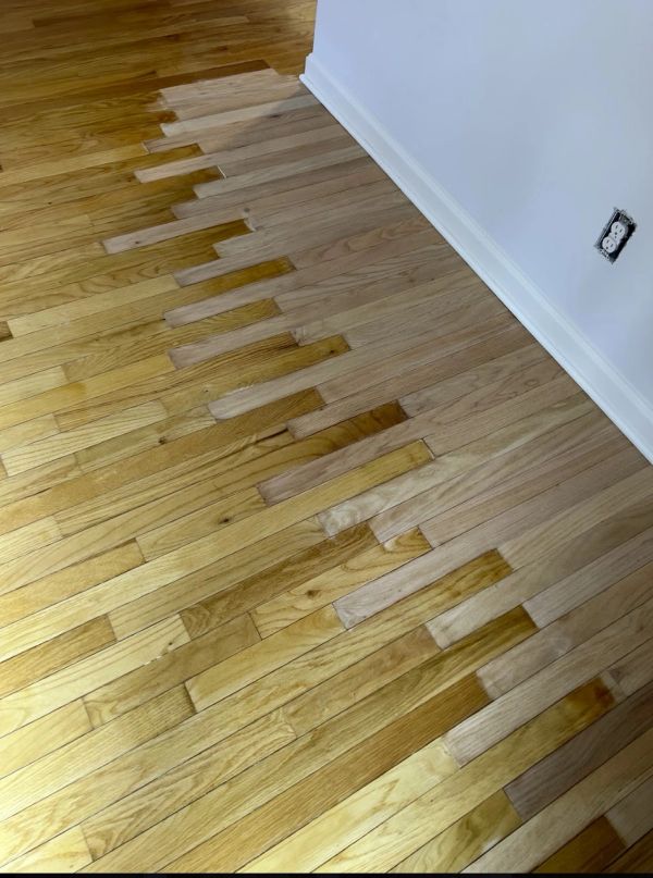 Repaired hardwood floor boards in a Hudson, Ohio home