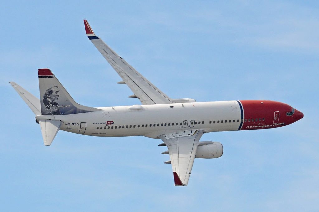 Norwegian airplane in the sky on it's way to gardemoen airport oslo, Norway.