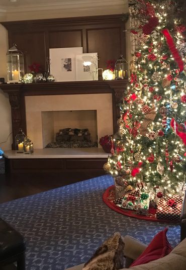 close up of Christmas tree and fireplace