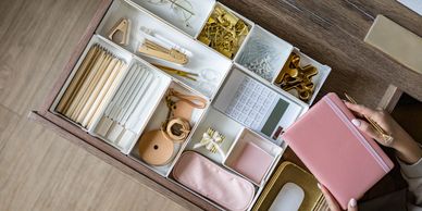 Organising a desk drawer into neat sections