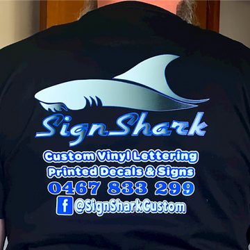 Sign Shark printed on the back side of a black color tshirt
