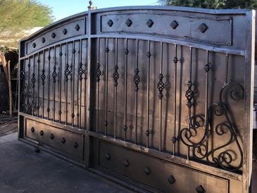 Custom raw iron rolling gate
