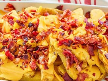 Fries topped with crispy bacon & melted cheese
