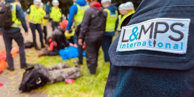 Geared -up Search and Rescue Team in Action. L&MPS 