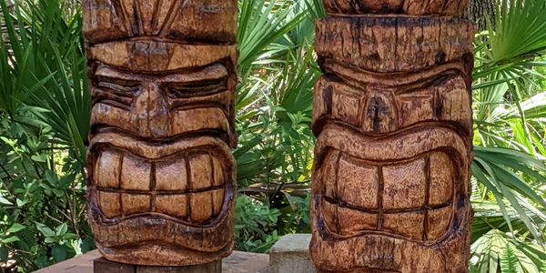 Tiki heads chainsaw wood carvings