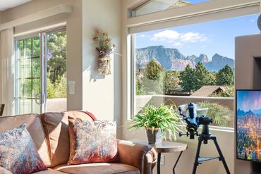 Red Rock views through telescope in living room