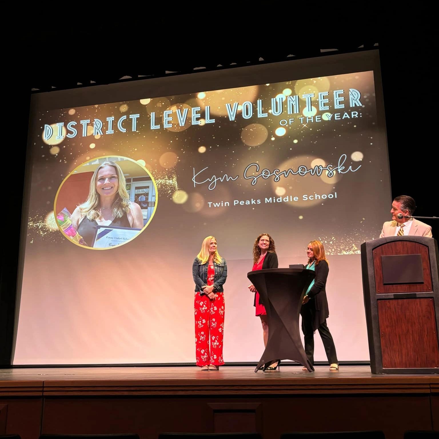 Award ceremony for district level volunteer of the year.