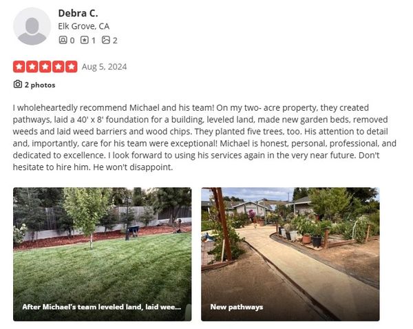 Well-maintained yard with fresh pathways and garden beds.