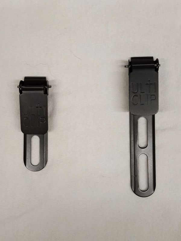 Two black UltiClip fabric clips with different lengths.