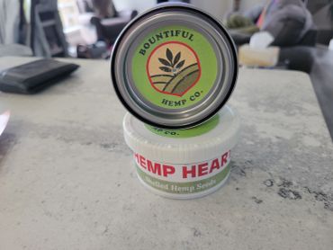Bountiful Hemp Co. container on a table.