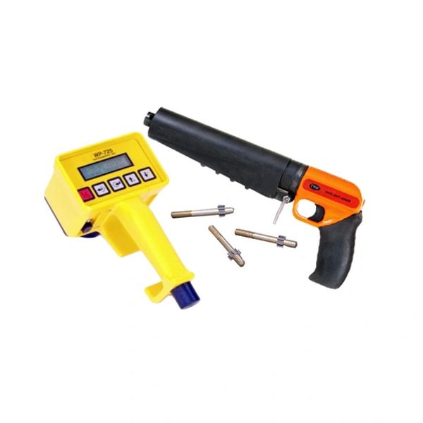 Digital torque wrench with accessories including bolts and calibration device.