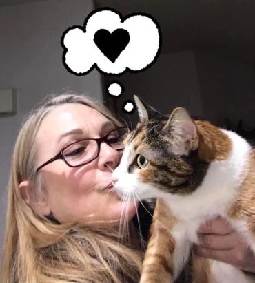 Cat Sitter for this busy active cat!  I can sneak in a quick kiss