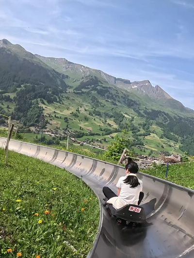 A kid on a toboggan ride