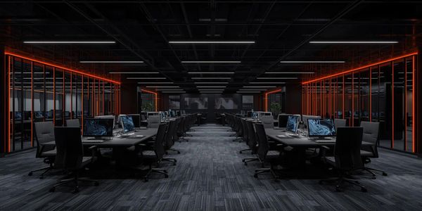 Open plan office with orange lighting