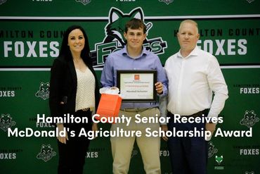 Nicole Moreland and Michael Moreland Present Agriculture Scholarship Award to Marshall Schuster