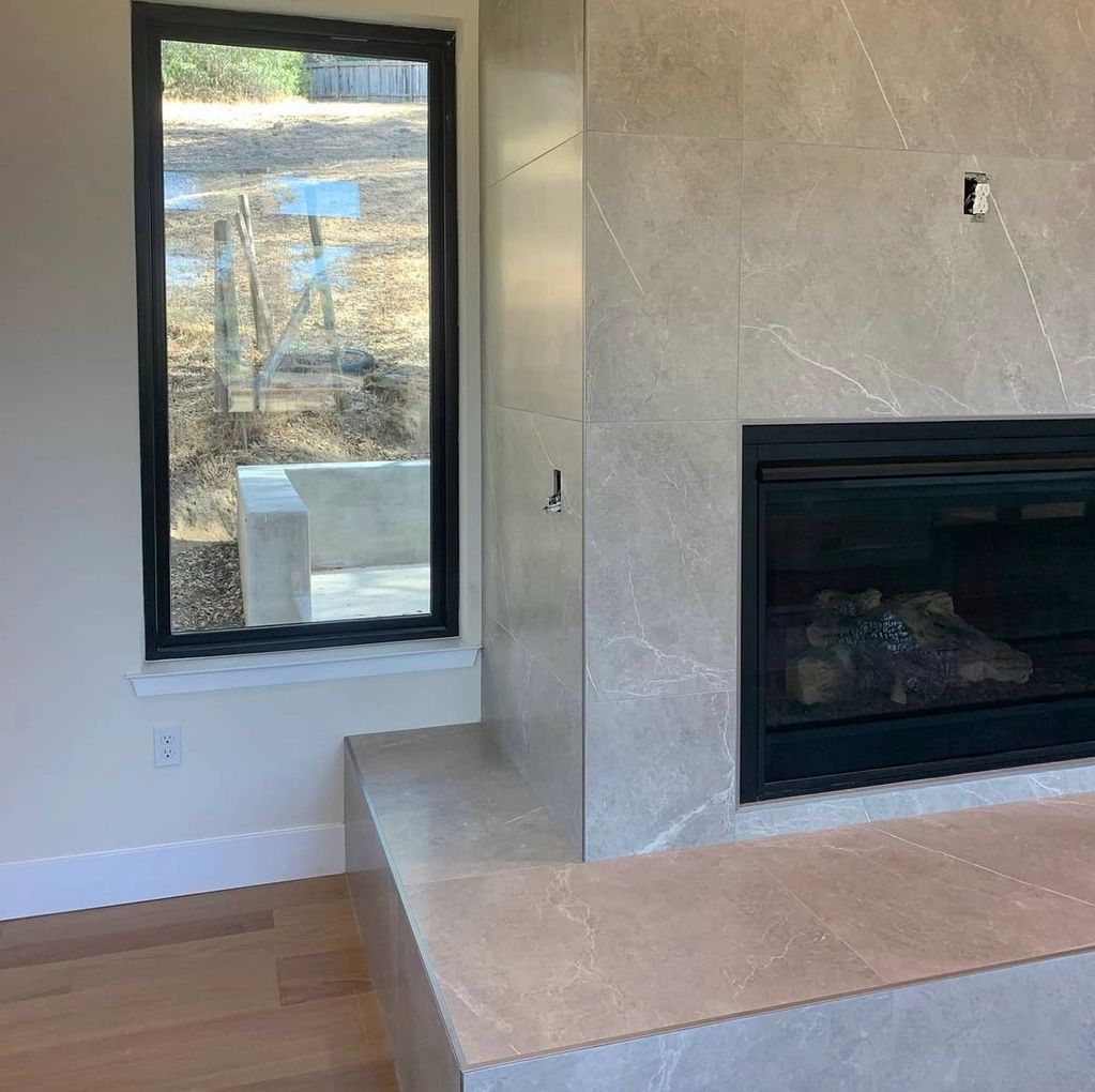 A classy designer chimney inside a house with window