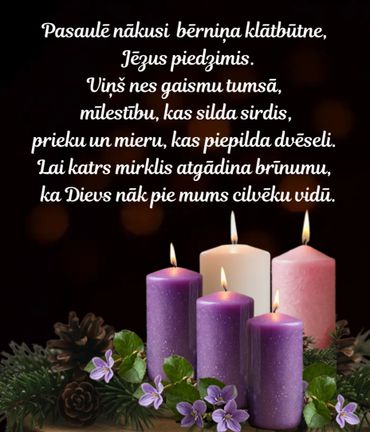 Advent candles with a Latvian Christmas blessing about Jesus bringing light and love.