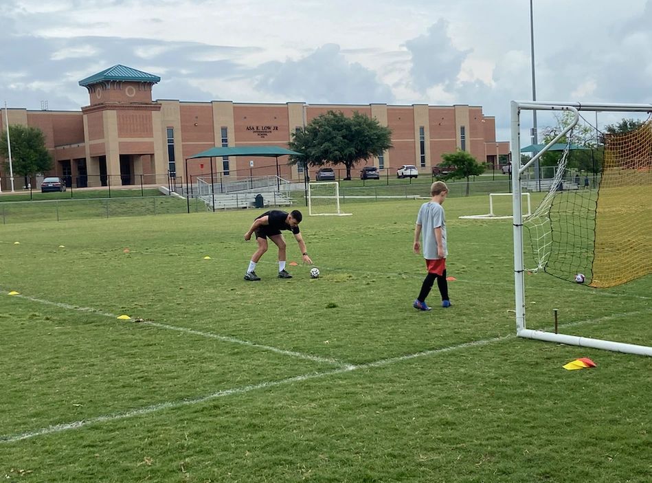 Coach Ben setting up for a 1 on 1 private session for a goalkeeper