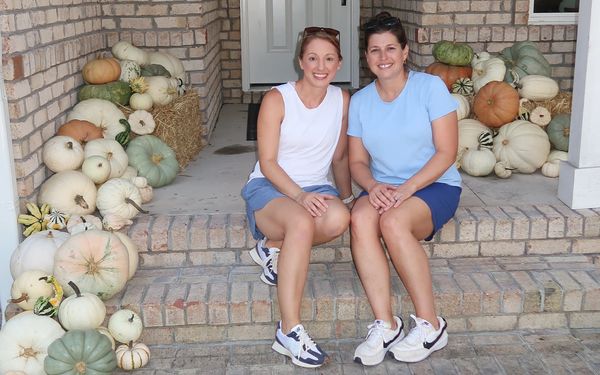 Owners after completing a lovely display of heirloom pumpkins