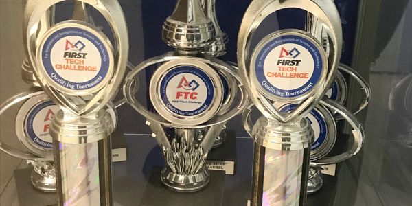 Trophies from FIRST Tech Challenge events.
