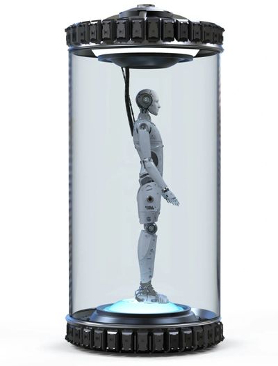 A humanoid robot suspended inside a futuristic cylindrical chamber.