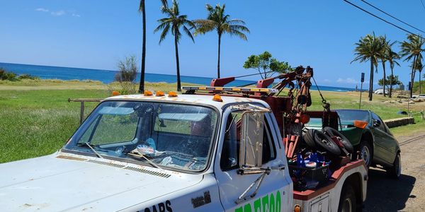 towing junk cars in paradise, keeping Oahu, Hawaii clean one junk vehicle at a time