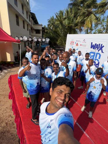Group selfie of people at a walkathon event.