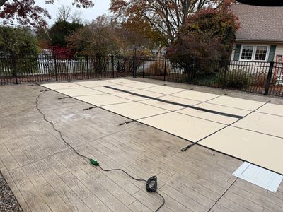 Winterization cover solid with drain strip