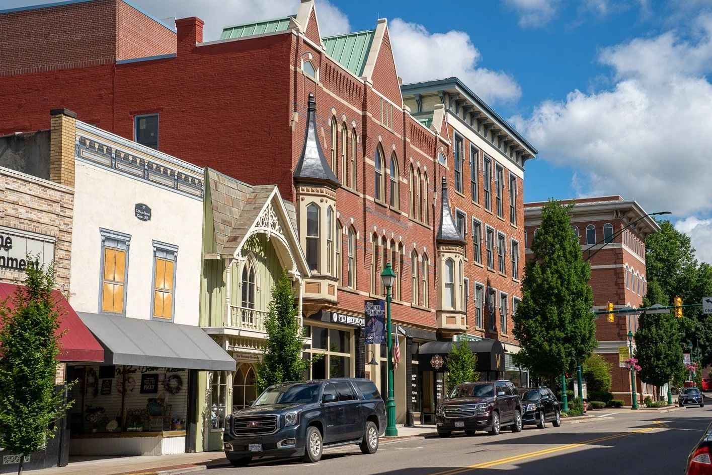 downtown with buildings and cars on the street road