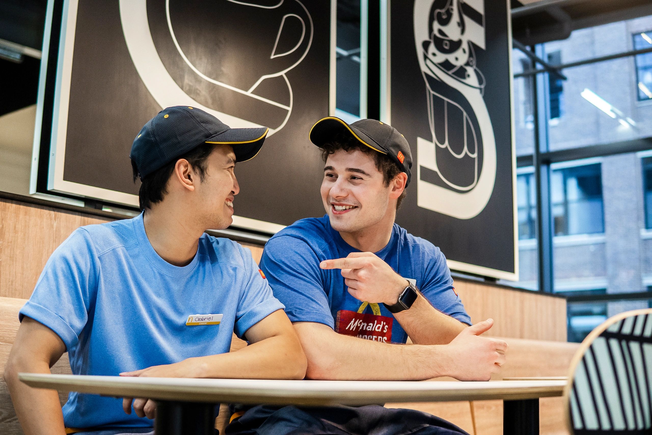 Two men discussing with each other