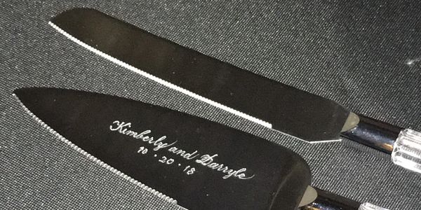 Custom hand engraved wedding cake server and knife. 