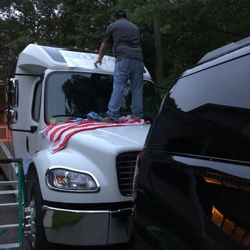 installation of large sticker on white bus