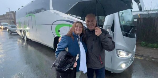 Suzie and Mike in the rain just about to leave
