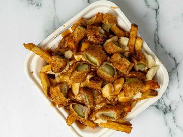 Fries, Chopped Deep fried pickles topped with Cheese curds & Gravy