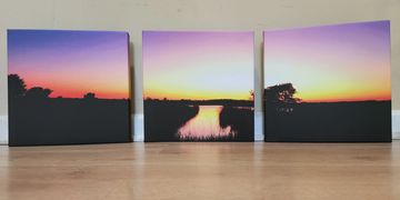 Three peice panoramic canvas set of the sunset in Bluegrass Indiana. Artwork made by Ashlyn Mudd