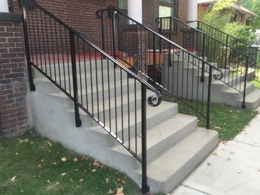 residential steps - concrete broom finish with metal railing (view 1)