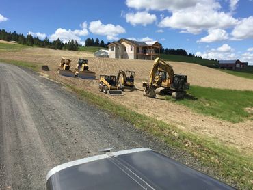 residential excavation - landscape grading with dozer and trackhoe