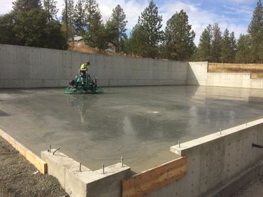 residential flatwork - shop slab (view 1) - power trowel smooth finish