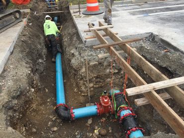 commercial utilities - water main installation (view 2a) - trenching