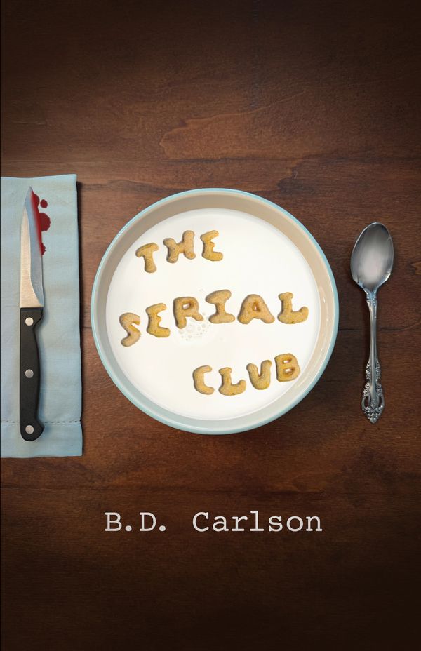 A bowl of milk with alphabet cereal spelling 'The Serial Club' next to a bloody knife and spoon.