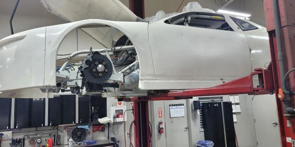 A paint with Racing car on the garage