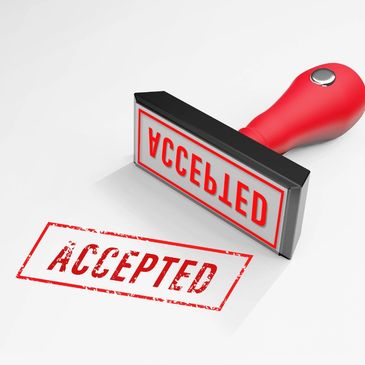 Red rubber stamp with the word 'ACCEPTED' stamped on white paper.