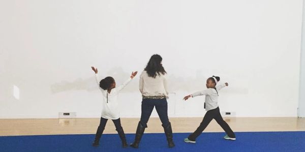 Teacher Liz Rosenberg playing with students on a field trip to the Building Museum in Washington, DC