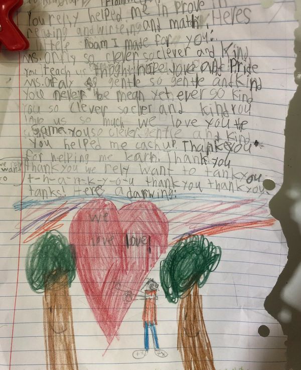 Handwritten student note to teacher "you really helped me improve in reading and writing"