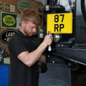 Land Rover Mechanic Working on Black Defender Garage Repairs Foulridge Lancashire
