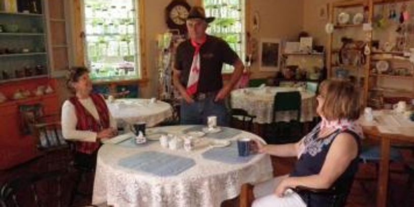 People enjoying tea room.