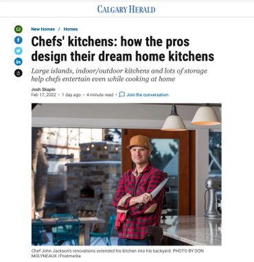 Chef John Jackson in his renovated kitchen with backyard view.
